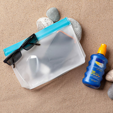 Zeal EcoBagz eco-friendly waterproof reusable bag in use on the beach