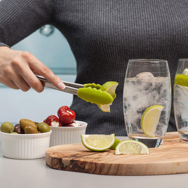Zeal Silicone Mini Tong serving lime quarters in to a drink