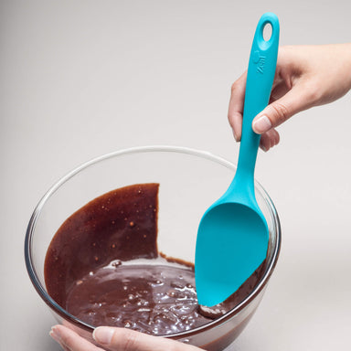 Using a Zeal Silicone Large Spatula Spoon to scrape a bowl