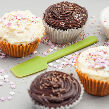 Using a Zeal Silicone Mini Baking Spatula to ice fairy cakes